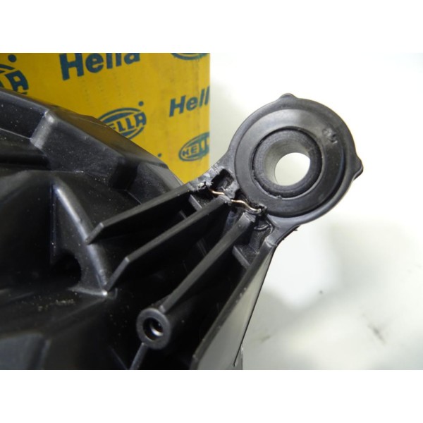 Phare projecteur avant gauche Hella 1EG247007-171 pour volkswagen golf 5 V jetta 5 V (1 patte fixation réparé) 