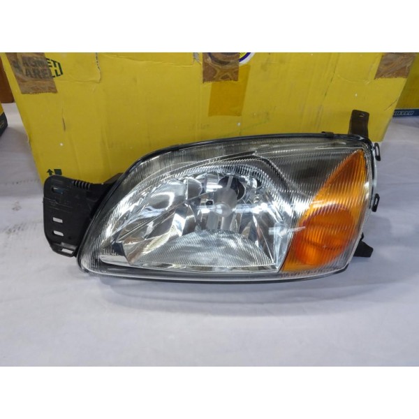 Phare projecteur avant gauche (1 patte cassé) Magneti marelli LPC332* 710301173105 pour ford fiesta 4 IV 