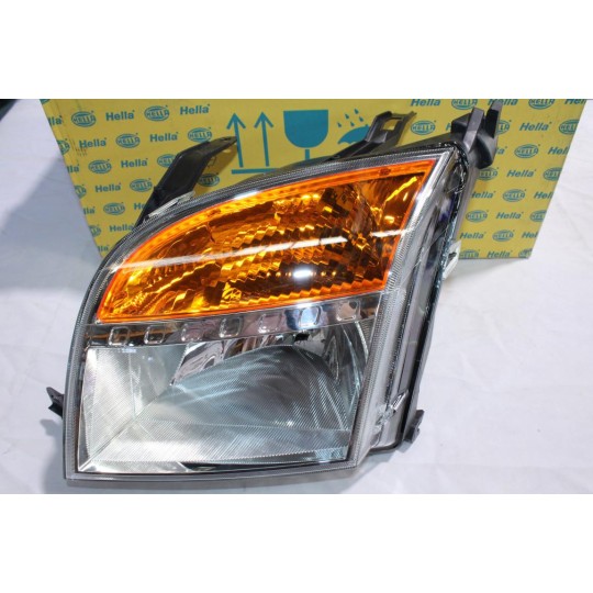 Phare projecteur avant gauche (1 patte cassé) Hella 1ED247026-251* pour ford fusion 