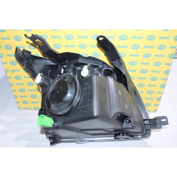 Phare projecteur avant gauche (1 patte cassé) Hella 1ED247026-251* pour ford fusion 