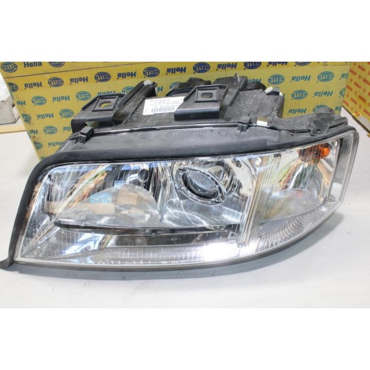 Phare projecteur avant gauche Hella 1EL007821-091 pour audi A6 de 1997 à 1999 