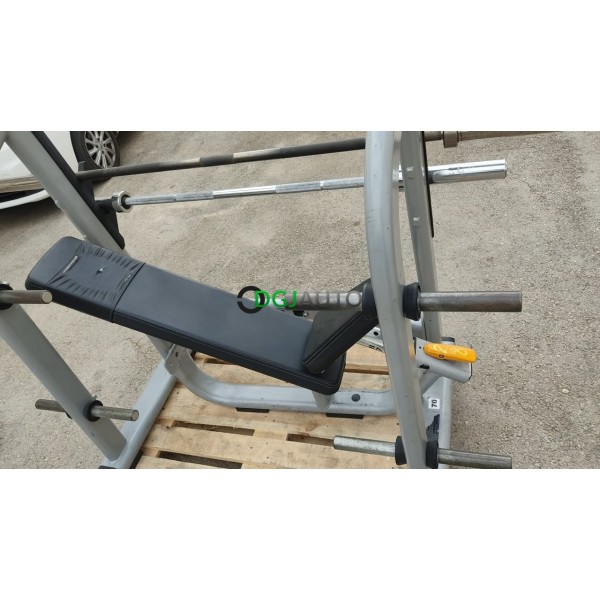 (Envoi nous consulter) 1 Banc de developpé couché incliné fixe occasion Precor avec 1 barre olympique 20kg banc propre mais