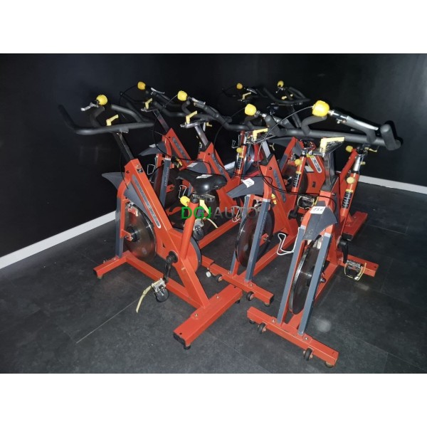 (Envoi nous consulter) Lot 10 velos de fitness biking pro spinning occasion Pulsefitness group cycle orange vendu en l'état