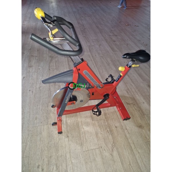 (Envoi nous consulter) Lot 10 velos de fitness biking pro spinning occasion Pulsefitness group cycle orange vendu en l'état