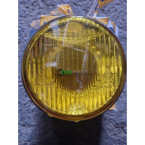 Phare projecteur avant gauche jaune Hella 1K3135371-011 pour BMW serie 3 E30 de 1983 à 1993