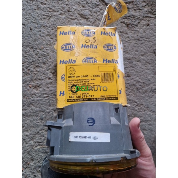 Phare projecteur avant gauche jaune Hella 1K3135371-011 pour BMW serie 3 E30 de 1983 à 1993