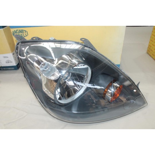 Phare projecteur avant droit (patte de fixation cassé réparé sans réclamation) Magneti Marelli LPL581 710301224306 pour ford 
