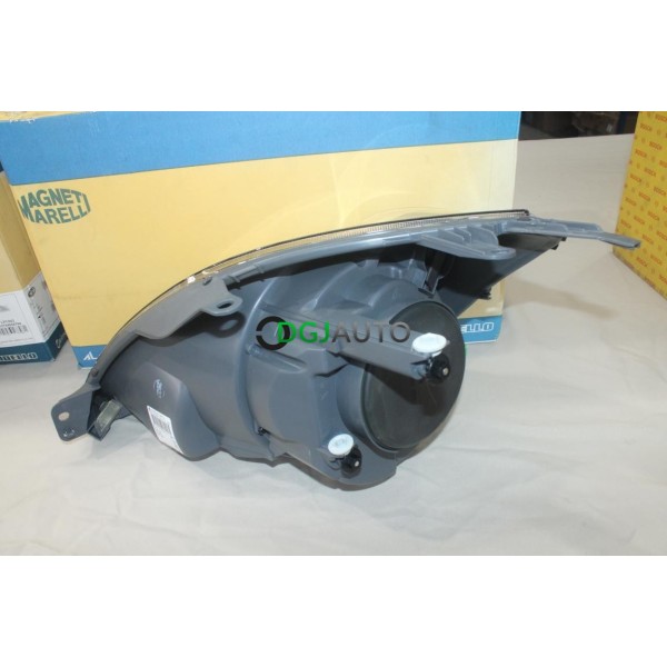 Phare projecteur avant droit (patte de fixation cassé réparé sans réclamation) Magneti Marelli LPL581 710301224306 pour ford